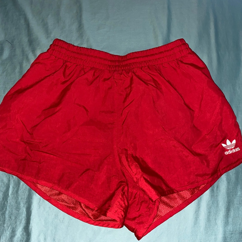 Red Adidas’s Primegreen shorts